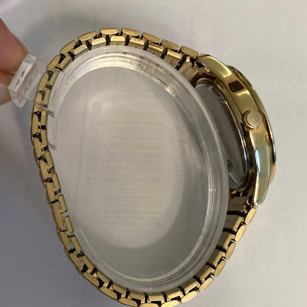 Timex gold tone Perpetual Calendar watch, stretch bracelet, new battery, indiglo